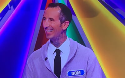 Wheel of fortune contestant with tattoos