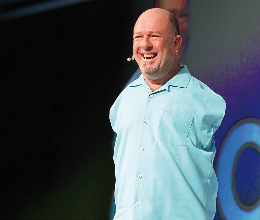 Alvin Law speaking on stage