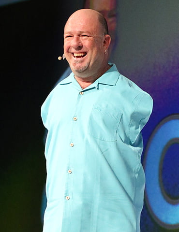 Alvin Law speaking on stage