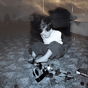 Alvin as a child learning to use his feet