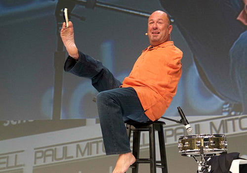 Alvin Law playing drums on stage